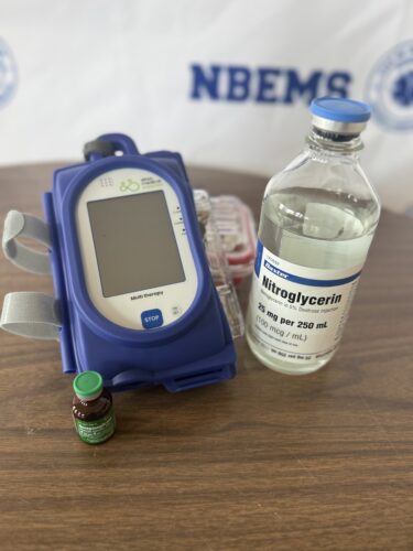 Sapphire IV Infusion pump, with a vial of Norepinephrine and Nitroglycerin